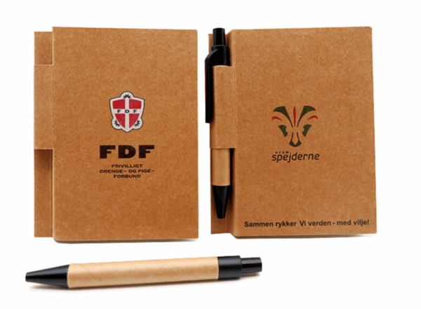 Kraft notebook with printed cover and matching pen in holder